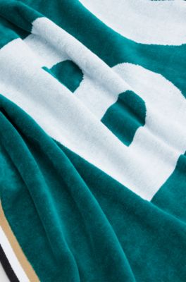 Cotton beach towel with logo and signature stripes, Dark Green