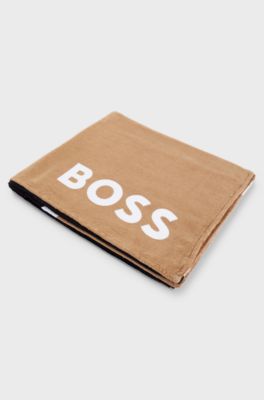 Cotton-velvet beach towel with colour-blocking and branding, Patterned