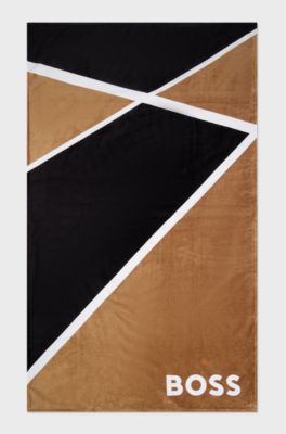 Cotton-velvet beach towel with colour-blocking and branding, Patterned