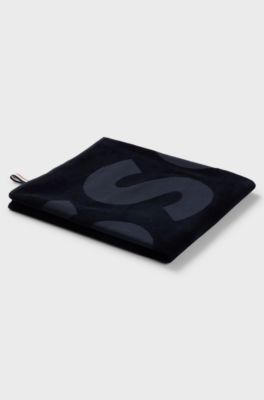 Cotton-velvet beach towel with sculpted logo, Black
