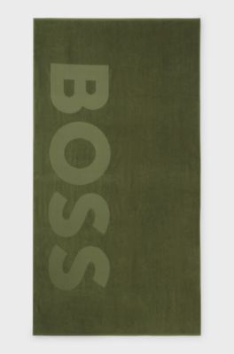 Cotton-velvet beach towel with sculpted logo, Dark Green