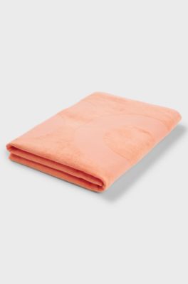 Cotton-velvet beach towel with sculpted logo, Orange