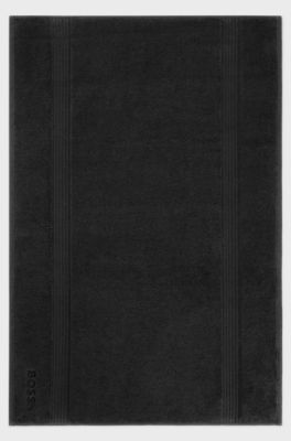 Black Aegean-cotton bath mat with tonal logo, Black