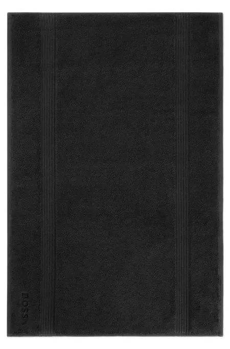 Black Aegean-cotton bath mat with tonal logo