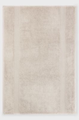 Beige badmat van Ege&iuml;sche katoen met ton-sur-ton logo, Lichtbeige