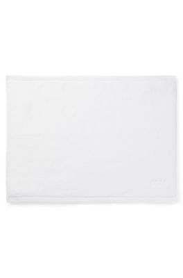 Cotton bath mat with contrast embroidered logo, White