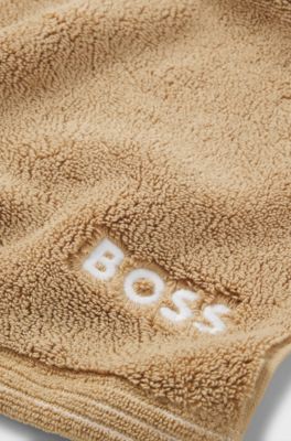 Cotton bath mat with contrast embroidered logo, Beige