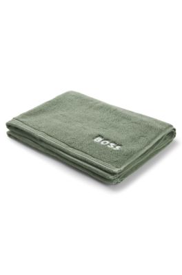Cotton bath mat with contrast embroidered logo, Green