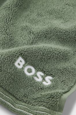 Cotton bath mat with contrast embroidered logo, Green