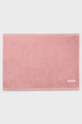 Cotton bath mat with contrast embroidered logo, light pink