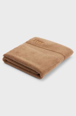 Badrumsmatta i bomull med broderad logga, Brun