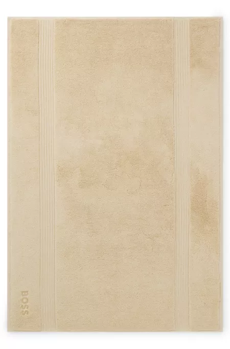 Tapis de bain à logo en coton de la mer Égée