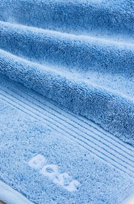 Badematte aus Baumwolle mit Logo-Stickerei, Blau