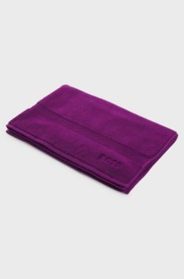 Cotton bath mat with embroidered logo, Purple