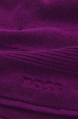 Cotton bath mat with embroidered logo, Purple