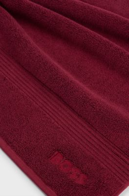 Cotton bath mat with embroidered logo, Dark Red