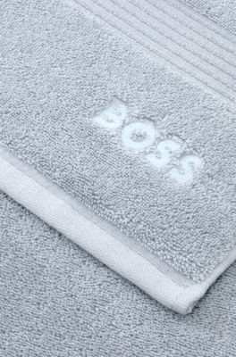 Cotton bath mat with embroidered logo, Light Blue