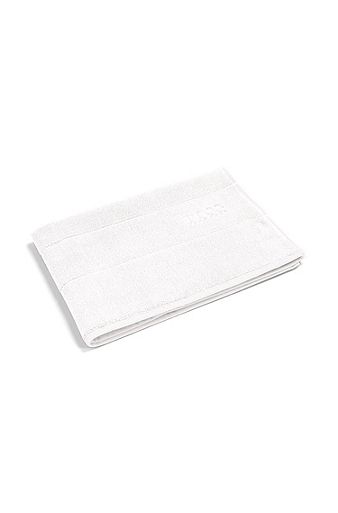 Cotton bath mat with contrast logo embroidery, White