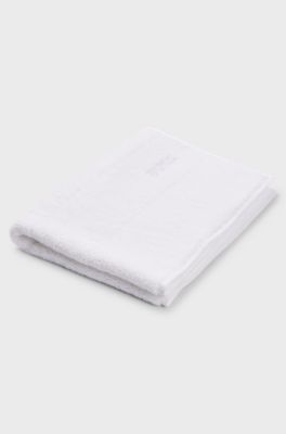Cotton bath mat with contrast logo embroidery, White