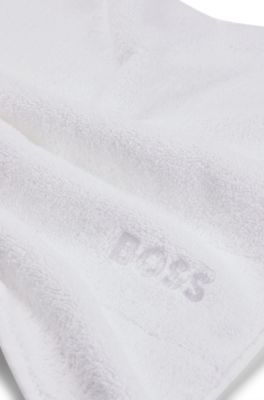 Cotton bath mat with contrast logo embroidery, White