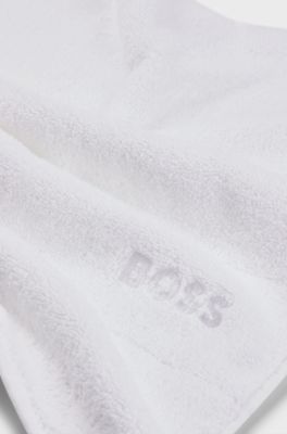 Cotton bath mat with contrast logo embroidery, White