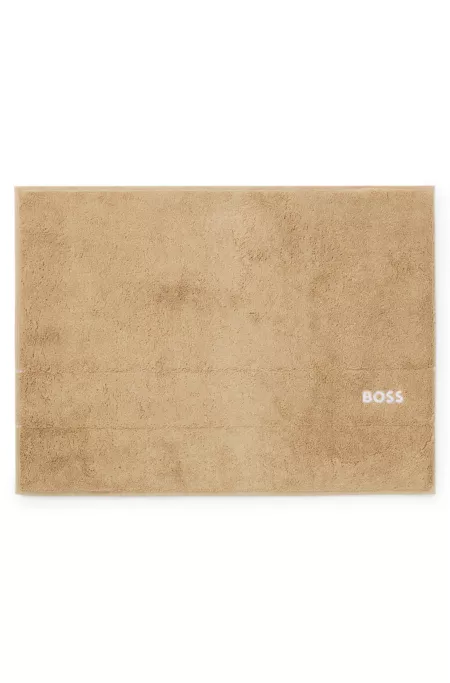 Cotton bath mat with contrast logo embroidery