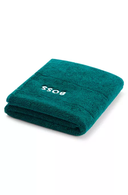 Cotton bath mat with contrast logo embroidery