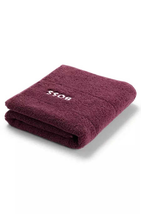 Cotton bath mat with contrast logo embroidery