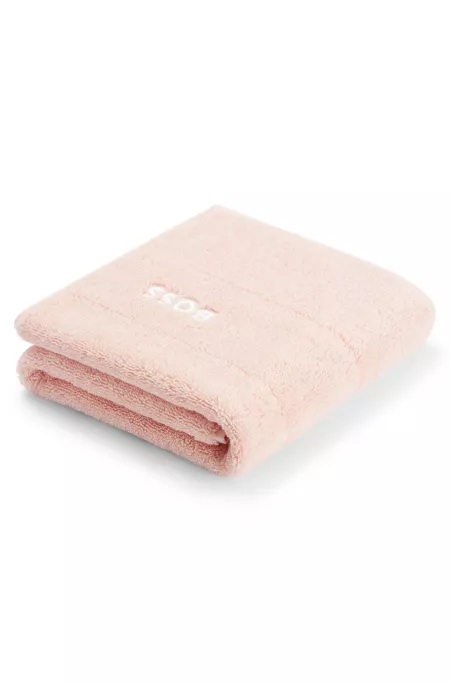 Cotton bath mat with contrast logo embroidery