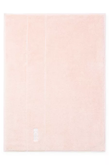 Cotton bath mat with contrast logo embroidery