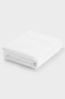 White cotton bath sheet with tonal embroidered logo, White