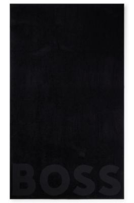 Cotton bath sheet with logo and signature-stripe strap, Dark Grey