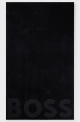 Cotton bath sheet with logo and signature-stripe strap, Dark Grey