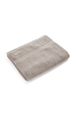 Katoenen badlaken met logostiksel, Lichtbeige