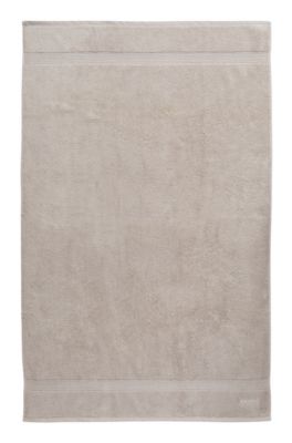 Katoenen badlaken met logostiksel, Lichtbeige