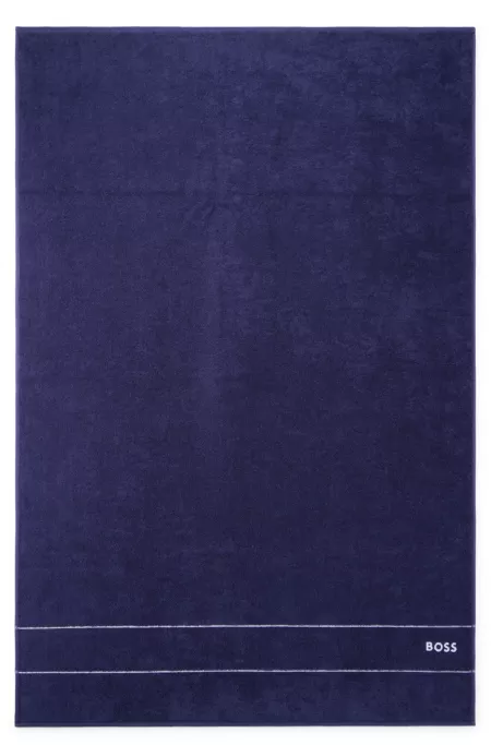 Cotton bath sheet with white logo embroidery