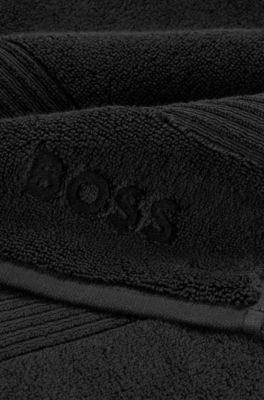 Black cotton bath sheet with tonal embroidered logo, Black