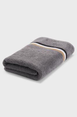 Cotton bath towel with signature-stripe border, Grey