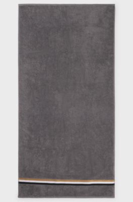 Cotton bath towel with signature-stripe border, Grey