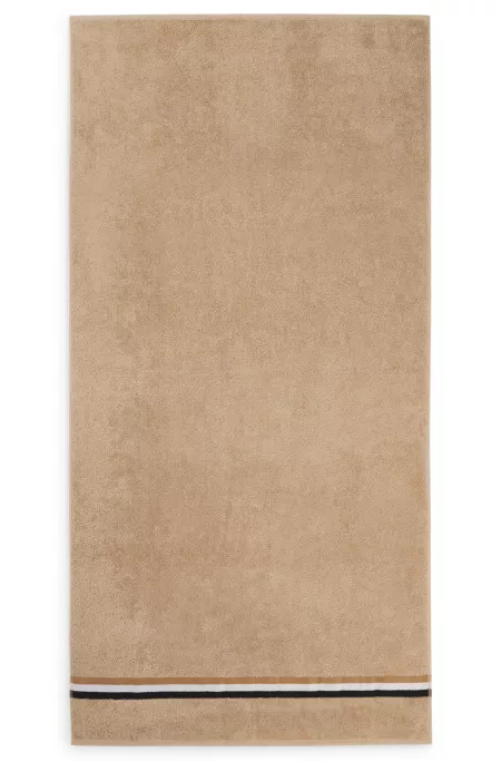 Cotton bath towel with signature-stripe border