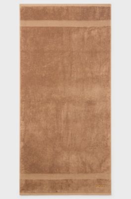 Serviette de bain en coton avec logo brod&eacute; ton sur ton, Marron