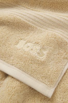 Cotton bath towel with tonal embroidered logo, Beige