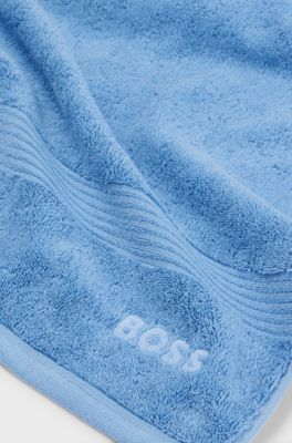 Badhanddoek van katoen met tonaal logostiksel, Blauw