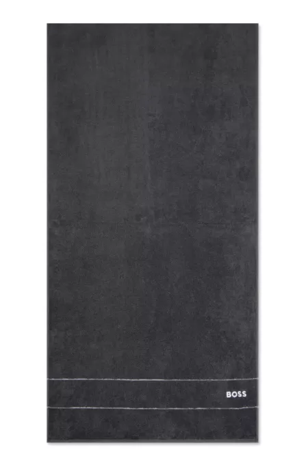 Cotton bath towel with white logo embroidery