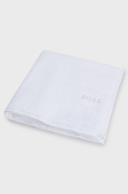 Cotton bath towel with white logo embroidery, White