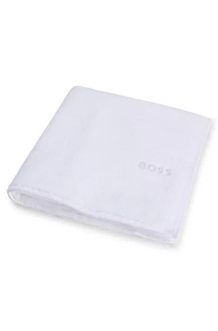 Cotton bath towel with white logo embroidery