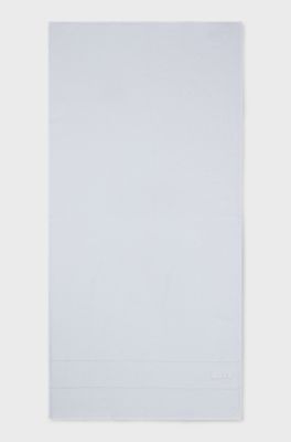 Cotton bath towel with white logo embroidery, White