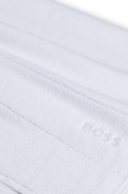 Cotton bath towel with white logo embroidery, White