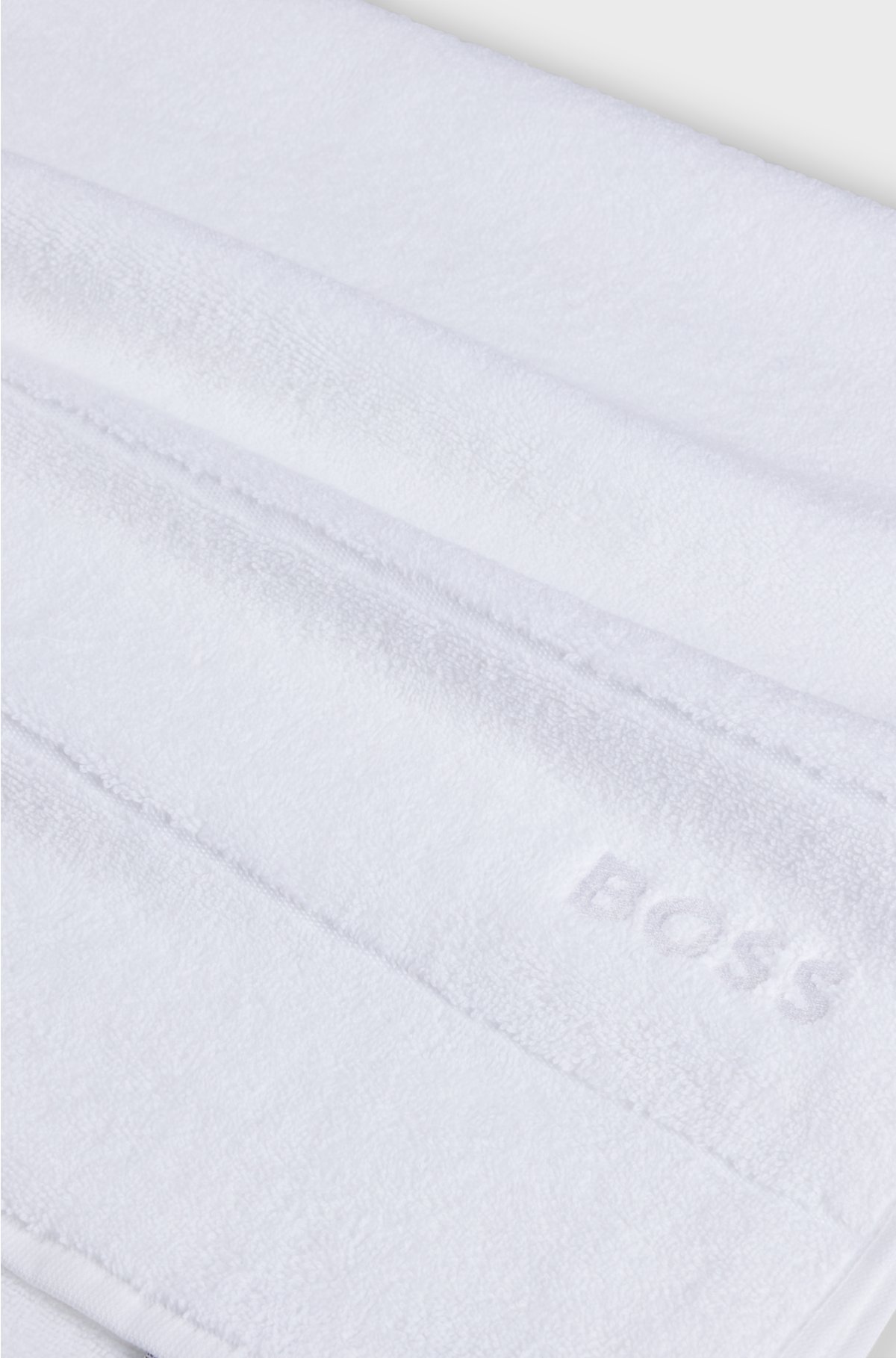 Cotton bath towel with white logo embroidery, White