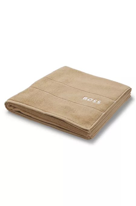 Cotton bath towel with white logo embroidery